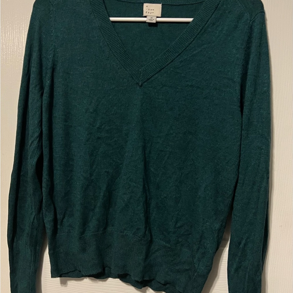 Comfortable green light sweater. Size “Me” from Target.